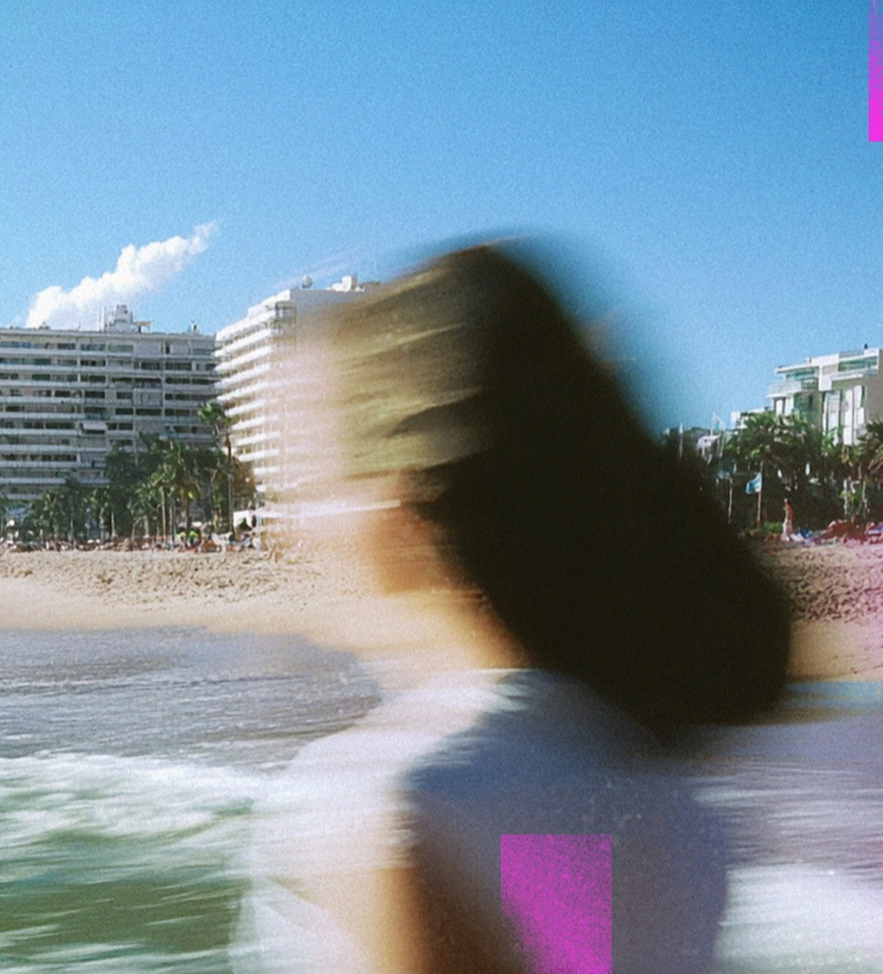 A blurred woman running on the beach