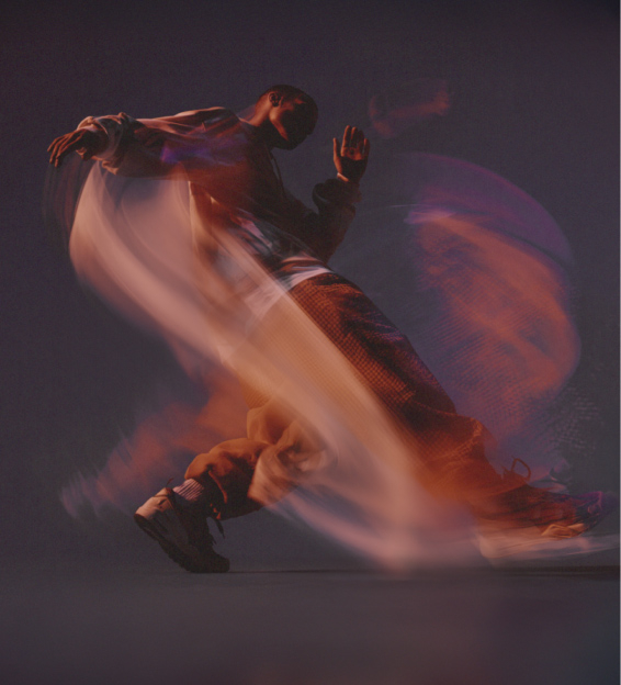 man dancing with swirls around