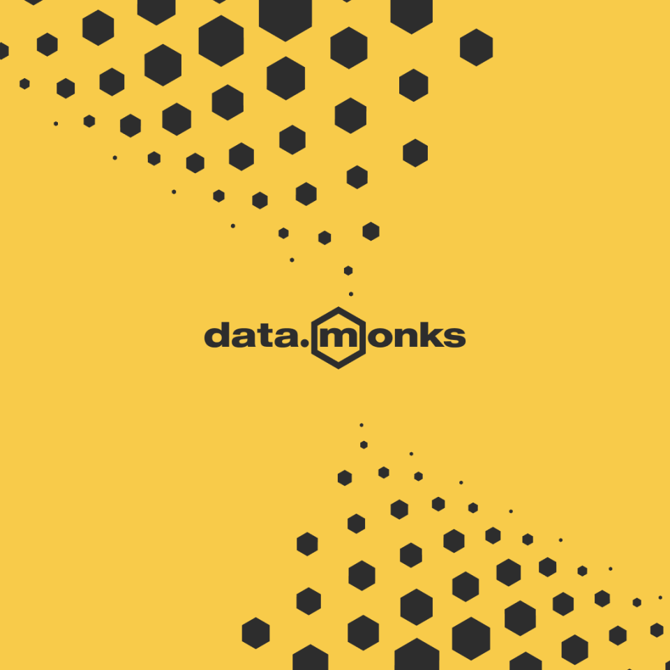 Yellow hexagon's fill a black background in a pattern