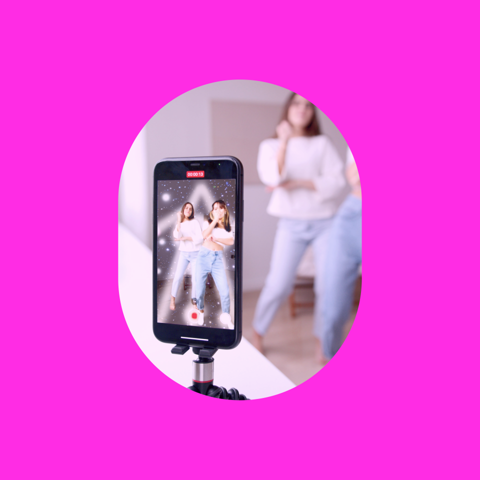 Two girls recording a dance video in AR
