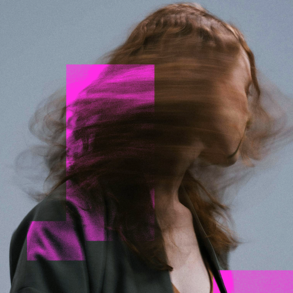 woman turning her head away from the camera