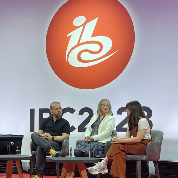 People on a panel at IBC talking