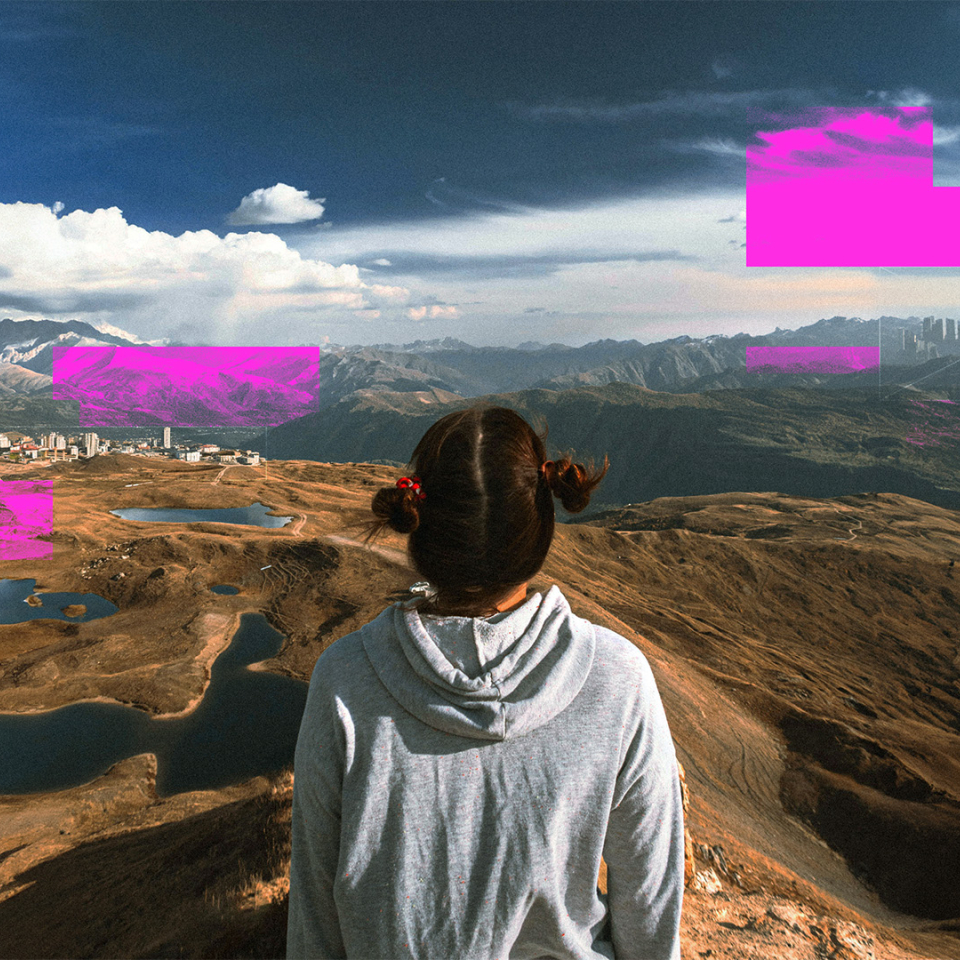 A person standing over mountains and cities