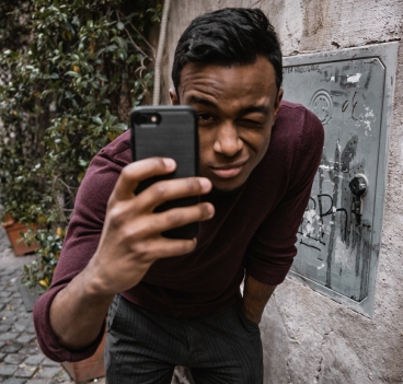 A person taking a photo with their phone