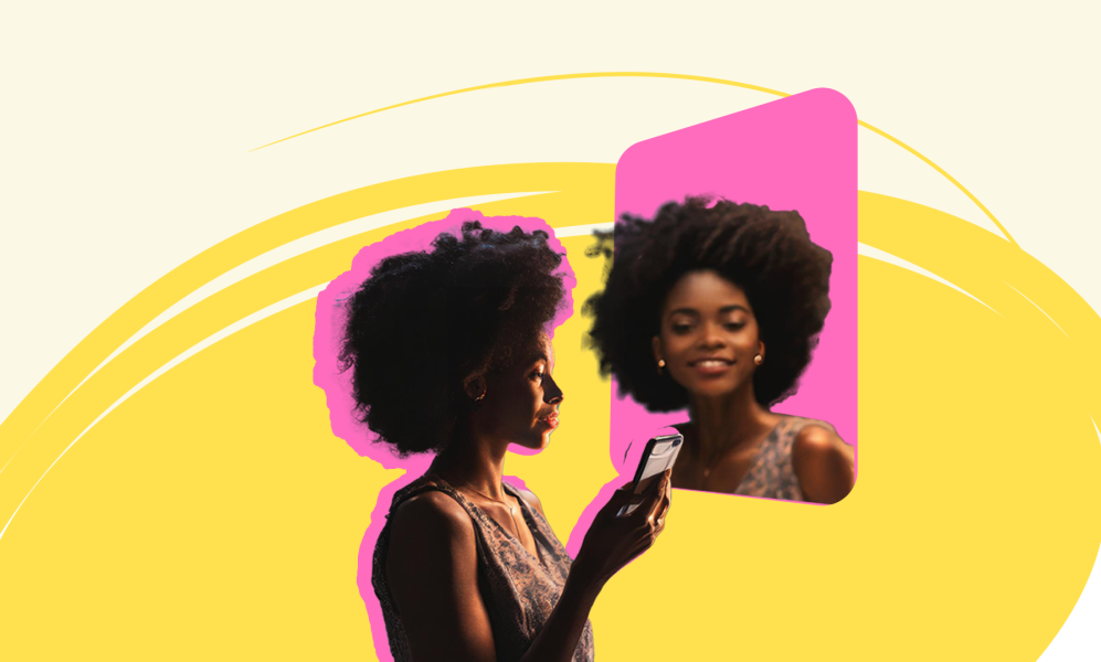 A young woman with a large afro hairstyle is holding a smartphone and looking at the screen. Her profile is highlighted with a pink outline. In the background, there is a mirror image of her smiling, framed by a pink rectangle. The backdrop features abstract yellow and white swirls.