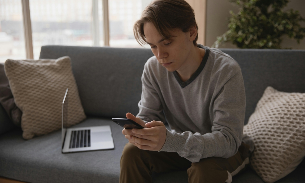 boy in his smartphone