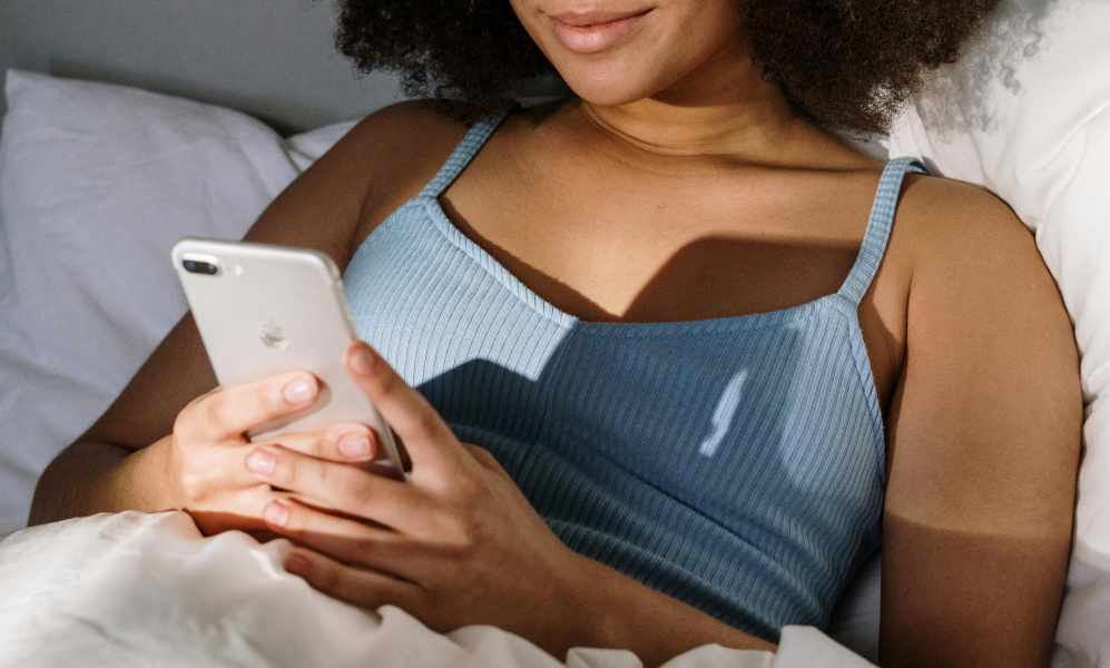 woman in her smartphone