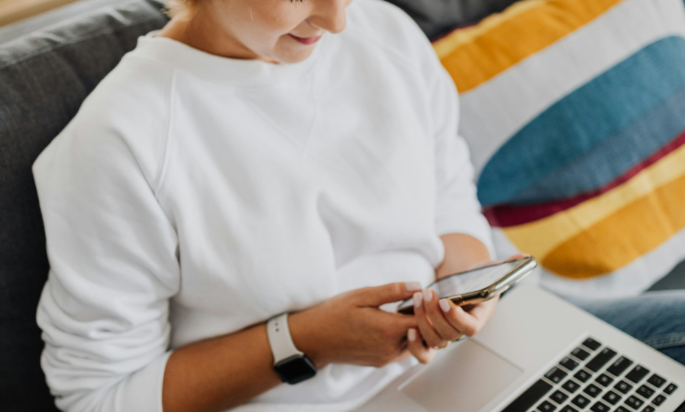 woman in her smartphone
