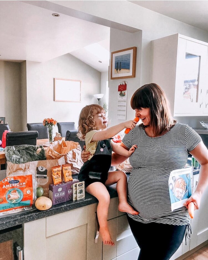 Mom with child on kitchen counter