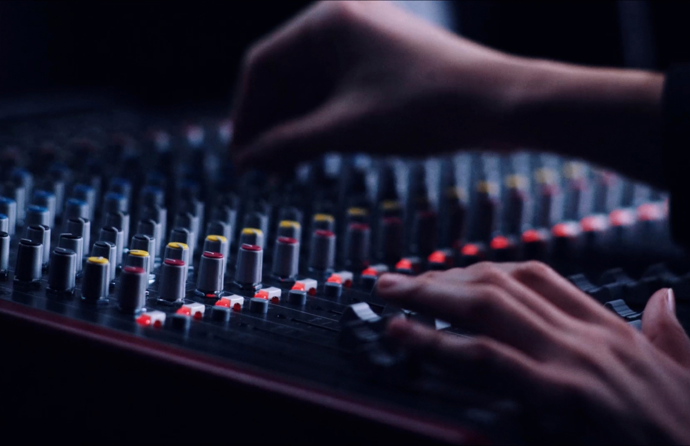 Hands on a sound board