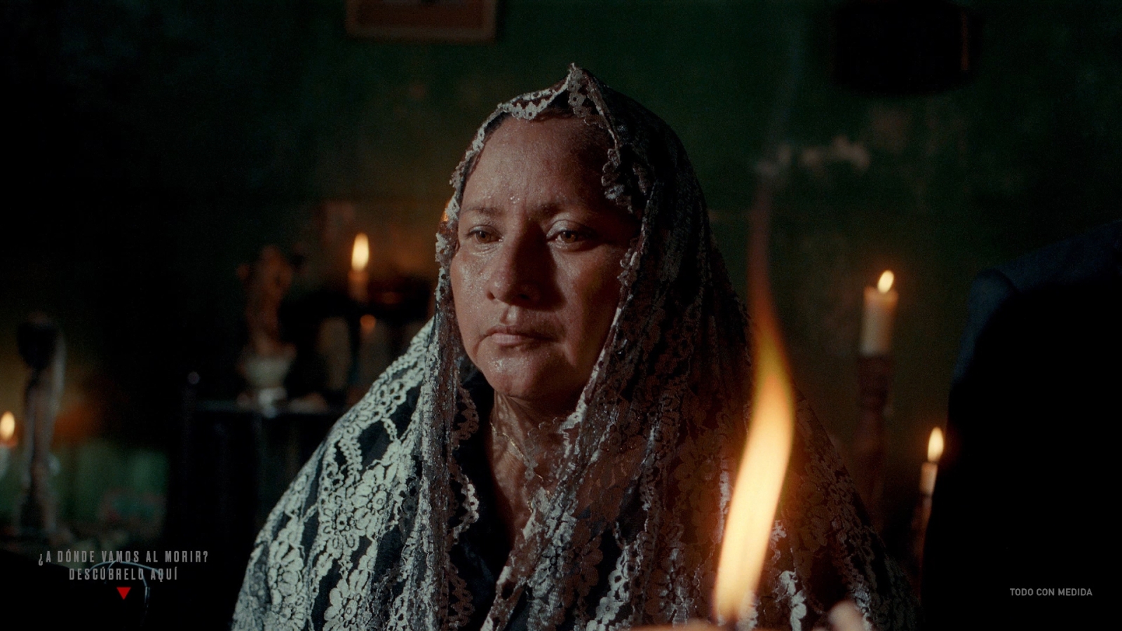 A person stands in front of an alter