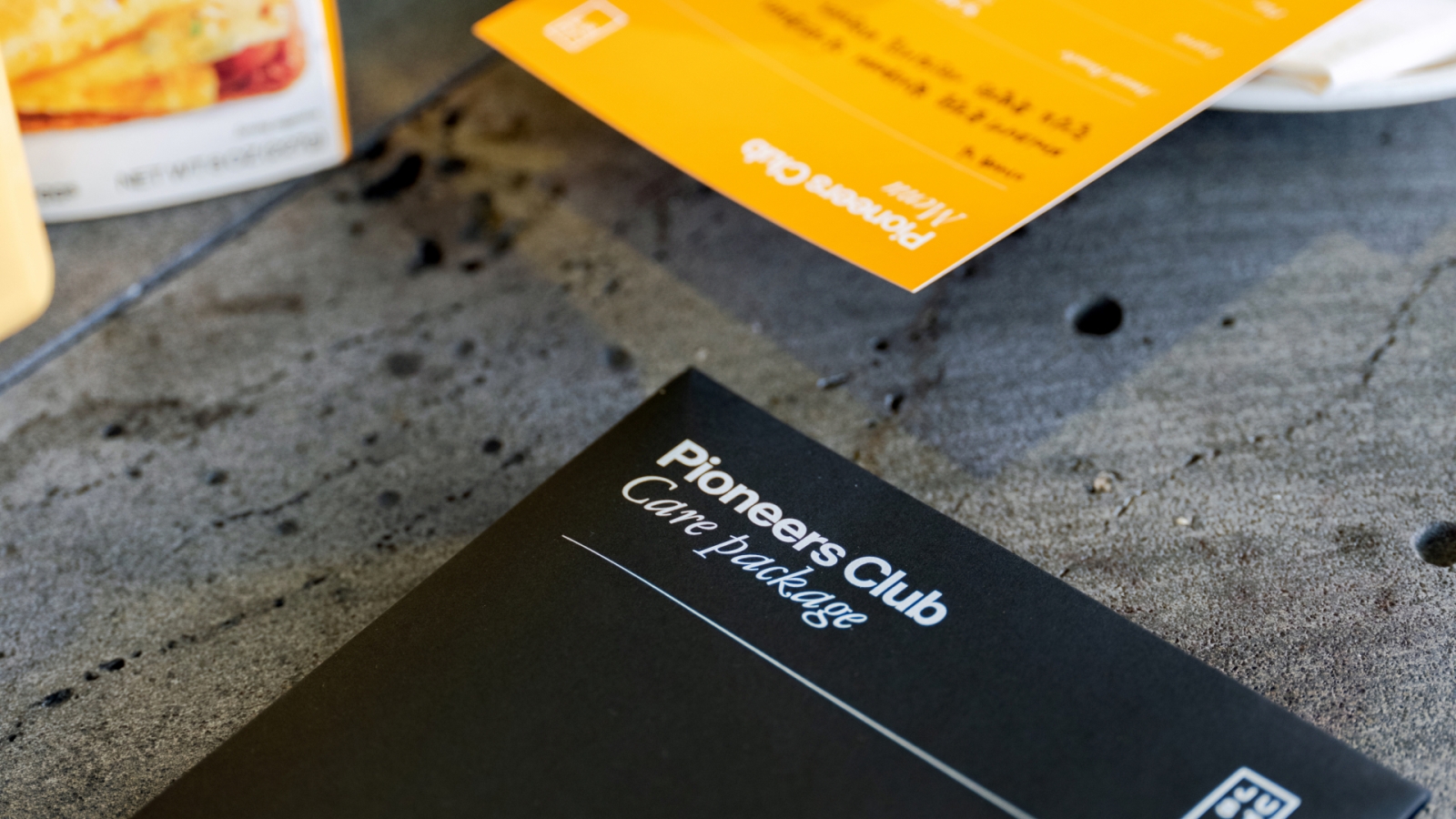 A personalized menu package shown at the dining table