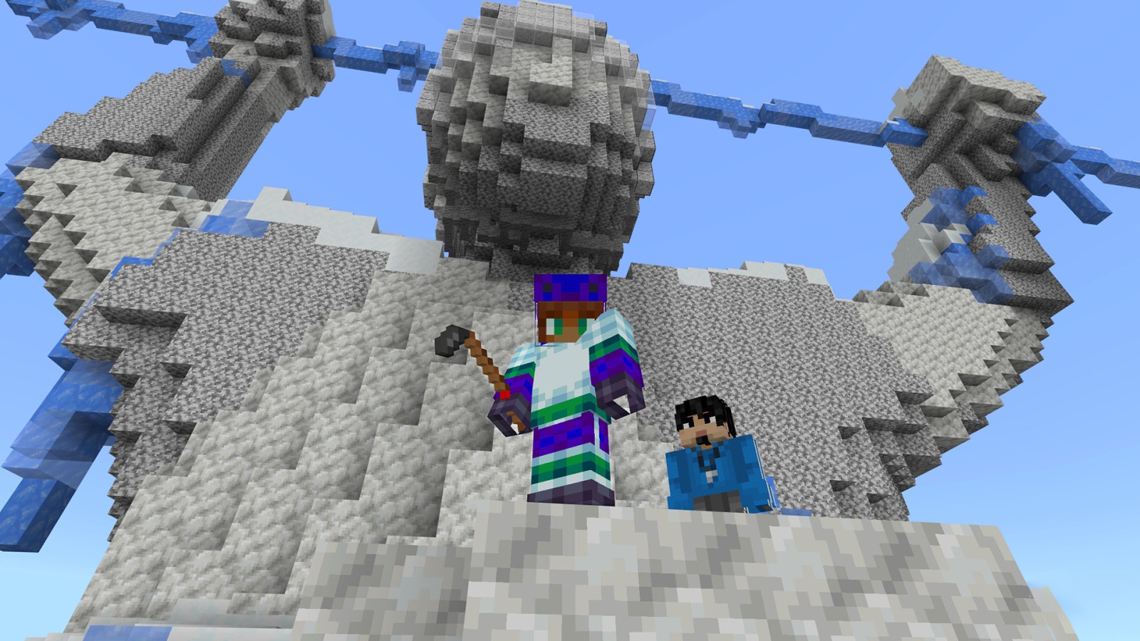 An avatar stands a top a peak in hockeyland