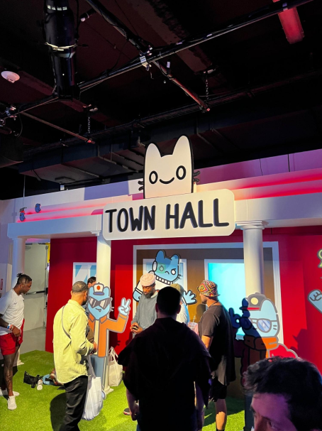 Cooltopia town hall with people taking pictures