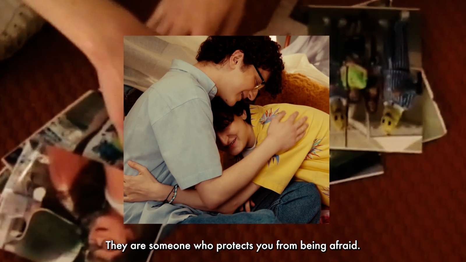 Two people holding each other