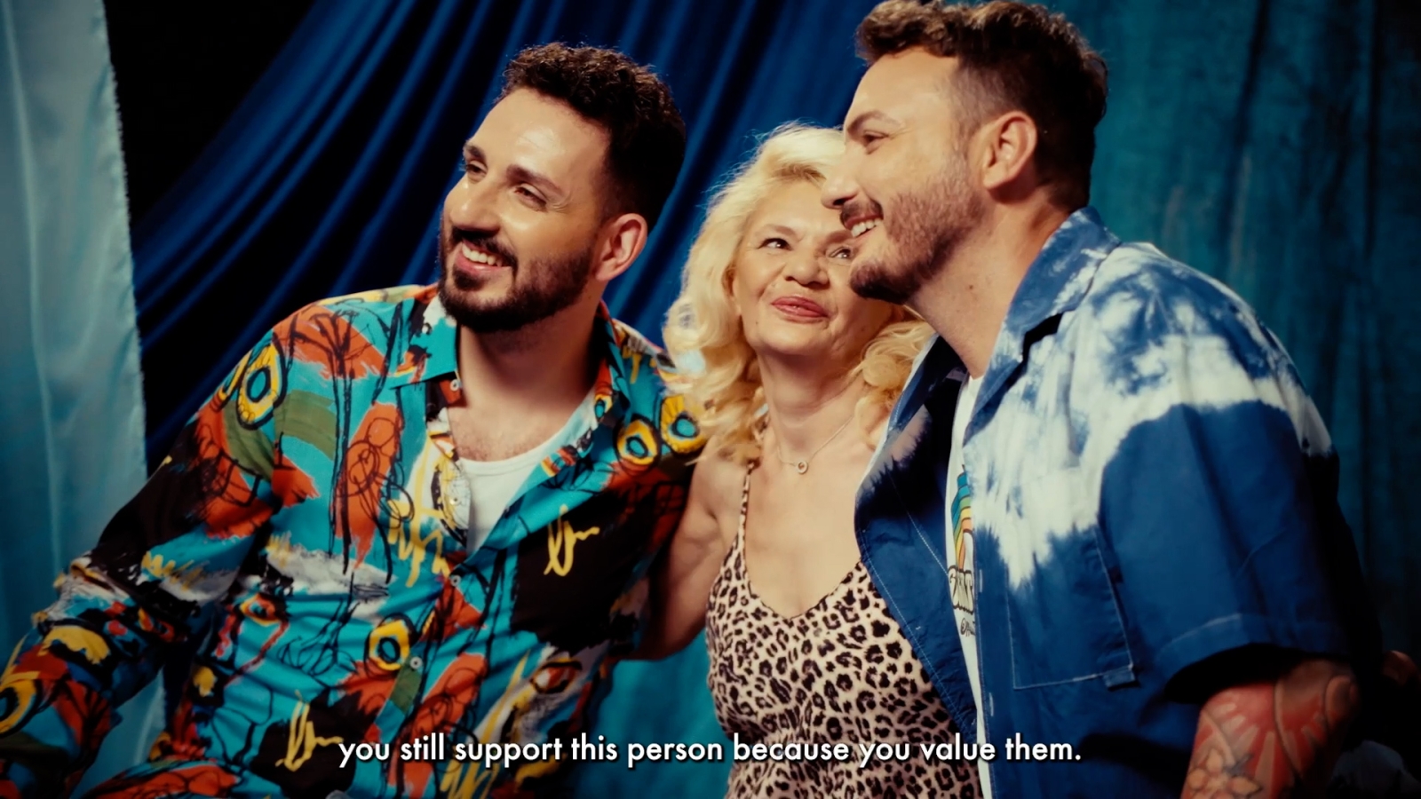 A mom holding her boys together