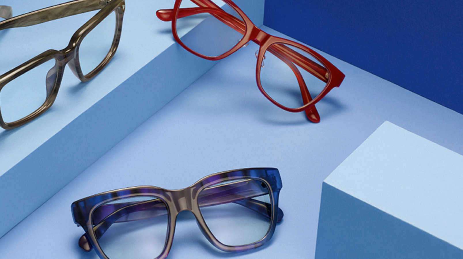 Glasses from FGX on a blue background