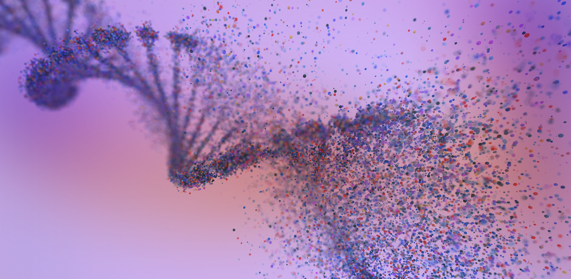 A vibrant, abstract depiction of a DNA strand, composed of numerous small, colorful particles. The double helix structure is visible on the left, rendered in shades of purple and blue. As it extends to the right, the DNA strand appears to dissolve into a scattered burst of individual particles, creating a dynamic, exploding effect. These particles are a mix of red, blue, green, and yellow, set against a soft, gradient background that transitions from a light purple on the left to a warm pinkish-orange.